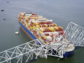 the cargo ship Dali is stuck under part of the structure of the Francis Scott Key Bridge