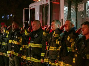 Firefighters salute in New York