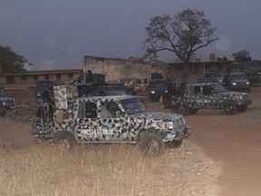 Nigerian army trucks are parked