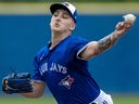 Blue Jays pitcher Ricky Tiedemann throws live batting practice during spring training action in Dunedin, Fla., Feb. 17, 2024.