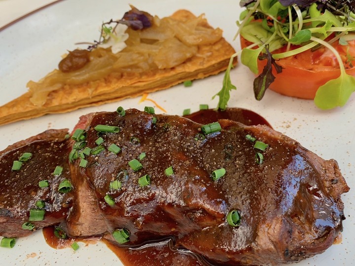  Hitting all the right notes at brunch is a bavette steak with an onion tart at Stanley in Le Centre Sheraton Montreal.
