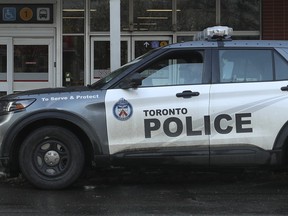 A Toronto Police vehicle sits outside the TTC's Wellesley Station on Jan. 26, 2023.