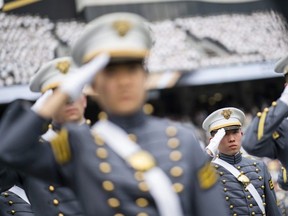 Graduating cadets salute during the graduation ceremony of the U.S. Military Academy class of 2021, May 22, 2021, in West Point, N.Y.