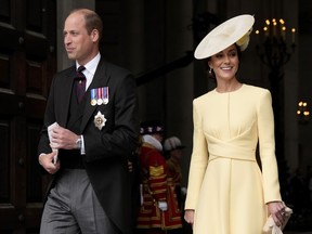 Britain's Prince William and his wife Kate leave after a service of thanksgiving for the reign of Queen Elizabeth II at St Paul's Cathedral in London, June 3, 2022.