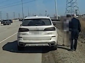 White SUV pulled over oh highway by police