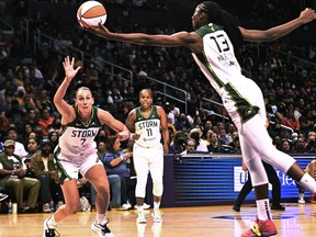 The WNBA is coming back to Canada for a pre-season game in Edmonton between the Los Angeles Sparks and the Seattle Storm on May 5. Seattle Storm centre Ezi Magbegor #13 reaches for the ball in front of forward Stephanie Talbot (7) during the first half of the team's WNBA basketball game against the Los Angeles Sparks, in Los Angeles, Thursday, July 7, 2022.