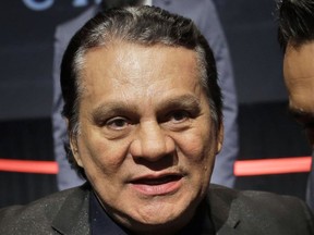 Boxing great Roberto Duran attends a news conference in New York, on Jan. 14, 2015. The family of boxing great Roberto Duran says he is receiving medical care for a heart problem. The 72-year-old Panamanian was a champion in four different weight classes. His family says he "has suffered a health complication due to an atrioventricular blockade." WBC president Mauricio Sulaiman says in a social media post that Duran is being treated in a hospital in Panama.