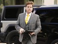 FILE - Dr. Craig Wright arrives at the Federal Courthouse, on Nov. 16, 2021, in Miami. Britain's high court ruled Thursday March 14, 2024 that an Australian computer scientist is not, as he claimed, the mysterious creator of the bitcoin cryptocurrency. Craig Wright has for eight years claimed that he was the man behind "Satoshi Nakamoto," the pseudonym that masked the identity of the creator of bitcoin.