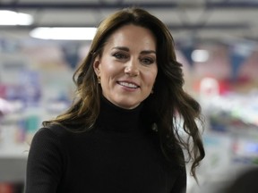 Britain's Kate, Princess of Wales smiles during her visit to Sebby's Corner in north London, Friday, Nov. 24, 2023.