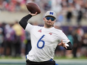 FILE - NFC quarterback Baker Mayfield, of the Tampa Bay Buccaneers, throws against the AFC during the flag football event at the NFL Pro Bowl football game, Sunday, Feb. 4, 2024, in Orlando. Mayfield is staying with the Tampa Bay Buccaneers after agreeing to a three-year contract worth up to $115 million, a person familiar with the deal told The Associated Press on Sunday, March 10, 2024.