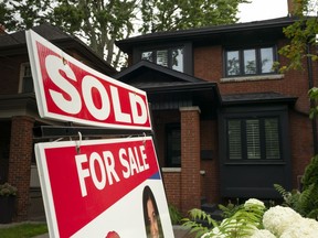 The Canadian Real Estate Association says February home sales jumped 19.7 per cent compared with a year ago. A West-end Toronto home for sale is shown in this July 15, 2023 file photo.
