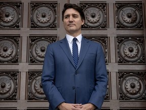 Prime Minister Justin Trudeau waits outside the west doors of West Block on Tuesday, March 5, 2024 in Ottawa.