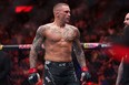 Dustin Poirier reacts after defeating Benoit Saint Denis of France in their lightweight bout at UFC 299 at Kaseya Center on March 9, 2024 in Miami.