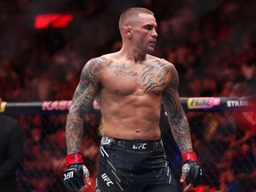 Dustin Poirier reacts after defeating Benoit Saint Denis of France in their lightweight bout at UFC 299 at Kaseya Center on March 9, 2024 in Miami.