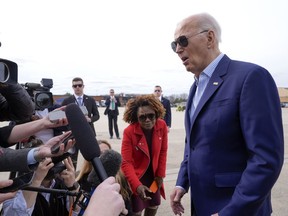 President Joe Biden talks to reporters before leaving Andrews Air Force Base, Md., Friday, March 8, 2024, to travel to Philadelphia for a campaign event.