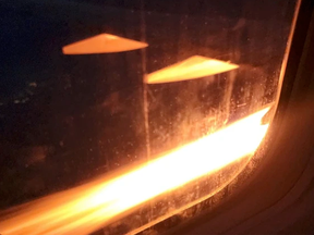 A screengrab from video of an engine fire on a United flight from Houston to Fort Myers, Texas on Monday, March 4, 2024.