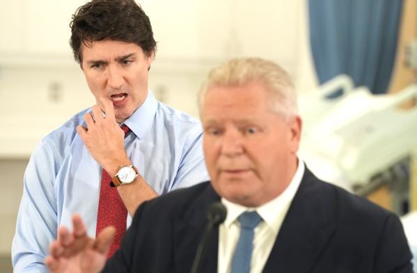 Prime Minister Justin Trudeau and Ontario Premier Doug Ford attend an announcement at Seneca College, in King City, Ont., Friday, Feb. 9, 2024.