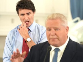 Prime Minister Justin Trudeau and Ontario Premier Doug Ford attend an announcement at Seneca College, in King City, Ont., Friday, Feb. 9, 2024.