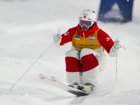 Canada's Mikael Kingsbury skis in the men's qualification of the freestyle ski world cup moguls at Val Saint-Come, Que., on Friday, Jan. 19, 2024. Kingsbury captured his 88th World Cup title with an individual moguls victory on Friday, but fell short of securing his 25th career Crystal Globe.THE CANADIAN PRESS/Sean Kilpatrick