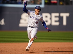 Toronto Blue Jays' Matt Chapman celebrates after his walkoff double against the Boston Red Sox during ninth-inning baseball game in Toronto, Sunday, Sept. 17, 2023.