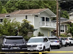 Honolulu police investigate the killings of multiple people at a home in Honolulu's Manoa neighbourhood, Sunday, March 10, 2024.