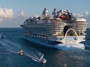 In an aerial view, Royal Caribbean's Icon of the Seas, billed as the world's largest cruise ship, heads out to sea for its second voyage from PortMiami on Feb. 3, 2024, in Miami, Fla.