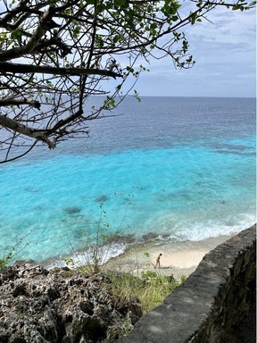 Snorkellers in the beautiful blue water at 1,000 Steps -- it's not really 1,000 steps to get to the beach -- dive site in Bonaire.