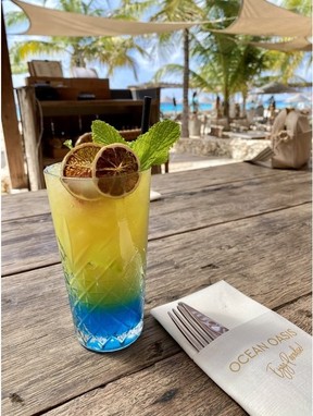 A cocktail with colours fitting for Bonaire at Ocean Oasis beach club.