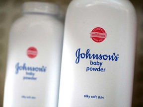 Containers of Johnson's baby powder made by Johnson and Johnson sits on a shelf at Jack's Drug Store on Oct. 18, 2019 in San Anselmo, Calif.