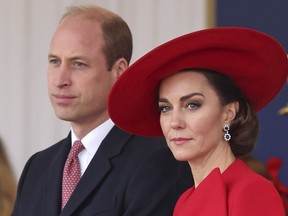 Britain's Prince William, left, and Kate
