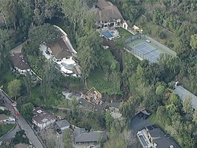 In this aerial image from KABC video shows the scene of a landslide in the Sherman Oaks area of Los Angeles, Wednesday, March 13, 2024.