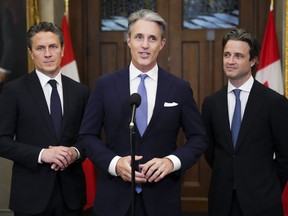 Brian Mulroney's three sons say there's no doubt their father would have been thrilled by this week's public tributes to honour his life. Mark, Ben, and Nicolas Mulroney, left to right, talk to media in the foyer following tributes to their father and late prime minister Brian Mulroney in the House of Commons on Parliament Hill in Ottawa on Monday, March 18, 2024.