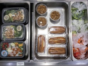 A sample of food items available during lunch break are shown at Tonalea K-8 school in Scottsdale, Ariz., Dec. 12, 2022. The New Democrats say they are pushing for the Liberal government to fund a national school food program in the upcoming budget.