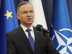 Poland's President Andrzej Duda gives a statement to the media in Warsaw, Poland, Wednesday Jan. 10, 2024, after the arrest of two politicians convicted of abuse of power who had taken refuge for hours in the presidential palace.