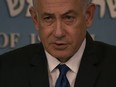 Israeli Prime Minister Benjamin Netanyahu delivers a speech after a meeting with German Chancellor Olaf Scholz in Jerusalem, Israel, Sunday, March 17, 2024. Quebec newspaper La Presse has removed a political cartoon that depicted Israeli Prime Minister Benjamin Netanyahu as the vampire from the silent film "Nosferatu" after criticism that the caricature used antisemitic imagery.