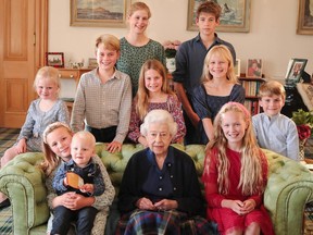 Queen Elizabeth II surrounded by her grandchildren and great-grandchildren, taken by Princess Kate in August 2022 at Balmoral.