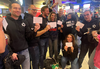 Jewish community members hold the cards they were given by security during the Raptors game on Tuesday, March 5, 2024 over their clothing. SUPPLIED/TORONTO SUN