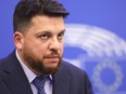 Russia's Leonid Volkov, Chief of staff for the 2018 presidential election for Alexei Navalny's campaign, looks on, at the European Parliament in Strasbourg, France, Dec. 15, 2021.