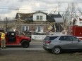 In this frame grab taken from video from WHAS, first responders stage outside a home in Milton, Ky., Thursday, March 14, 2024, after a severe weather system came through the area. (WHAS via AP)