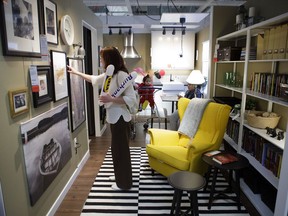 A shopper looks at decorative art at a new IKEA store during the grand opening in Burbank, Calif., Feb. 8, 2017.