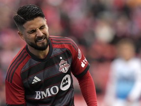 Toronto FC's feel-good start to the Major League Soccer season is being tempered by a string of injuries. As John Herdman's team prepares to host Sporting Kansas City on Saturday, supporters are awaiting word on the status of Italian star Insigne, who limped off the field in the first half of last week's 2-0 win over Atlanta United. Insigne winces during MLS action against Charlotte FC in Toronto, Saturday, March 9, 2024.
