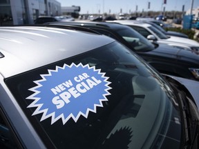 Statistics Canada says retail sales fell 0.3 per cent to $67.0 billion in January as sales at new car dealers dropped. A new vehicle for sale is seen at an auto mall in Ottawa, on Monday, April 26, 2021.