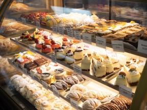 Sweet treats and baked goods in case at R Bakery.