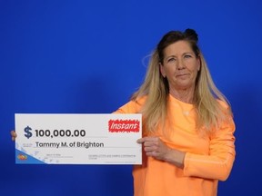 Tammy Meikle of Brighton, won $100,000 in the Hot Slot Multiplier instant game after earlier winning $10,000 in 2019 playing The Big Spin.