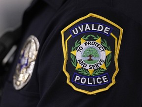 A Uvalde police officers patch and badge