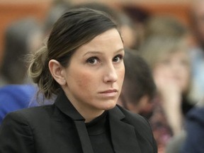 FILE - Kouri Richins, a Utah mother of three who authorities say fatally poisoned her husband, Eric Richins, in March 2022, then wrote a children's book about grieving, looks on during a hearing, Nov. 3, 2023, in Park City, Utah. Richins faces another attempted murder charge for allegedly drugging her husband weeks earlier on Valentine's Day, according to new charging documents filed Monday, March 25, 2024.