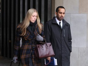 Umar Zameer (middle), who has pleaded not guilty to first-degree murder in the death of Toronto Police Const. Jeffrey Northrup on July 1, 2021 in the parking lot of Toronto's City Hall, is seen leaving the 361 University courthouse with one of his lawyers, Alexandra Heine, on Tuesday, March 19, 2024.