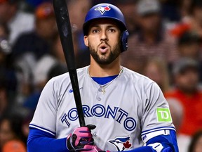 Blue Jays' Geroge Springer takes a breath during an at-bat against the Houston Texans.