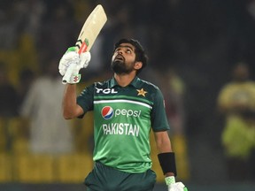 Pakistan's captain Babar Azam celebrates after scoring a century during the third and final one-day international (ODI) cricket match between Pakistan and Australia in 2022.