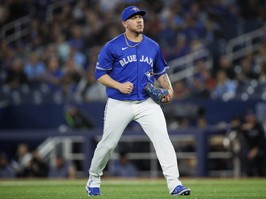 Yariel Rodriguez of the Toronto Blue Jays reacts after his third out of the first inning of his MLB debut.